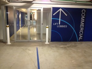 PUSH door into lift lobby